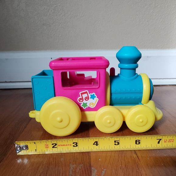 kid's toy CoComelon colorful yellow pink blue musical train - Picture 1 of 7